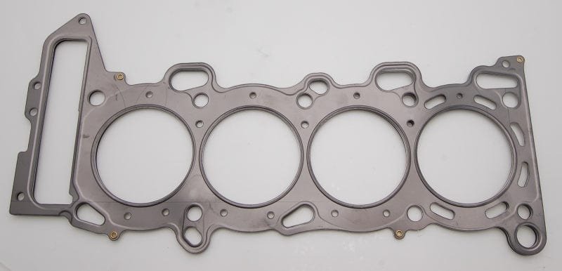 125e4d18bd47b70379971f3183a74c50_ce00a24f-1df1-49da-9d4c-c8d043be4737.jpg Cometic Nissan SR20DE / DET S13 87.5mm .070 inch MLS Head Gasket w / 1 Extra Oil Hole - Image 1